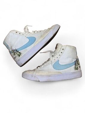 Nike White High-Top Sneakers with Light Blue Swoosh and Floral Embroidery